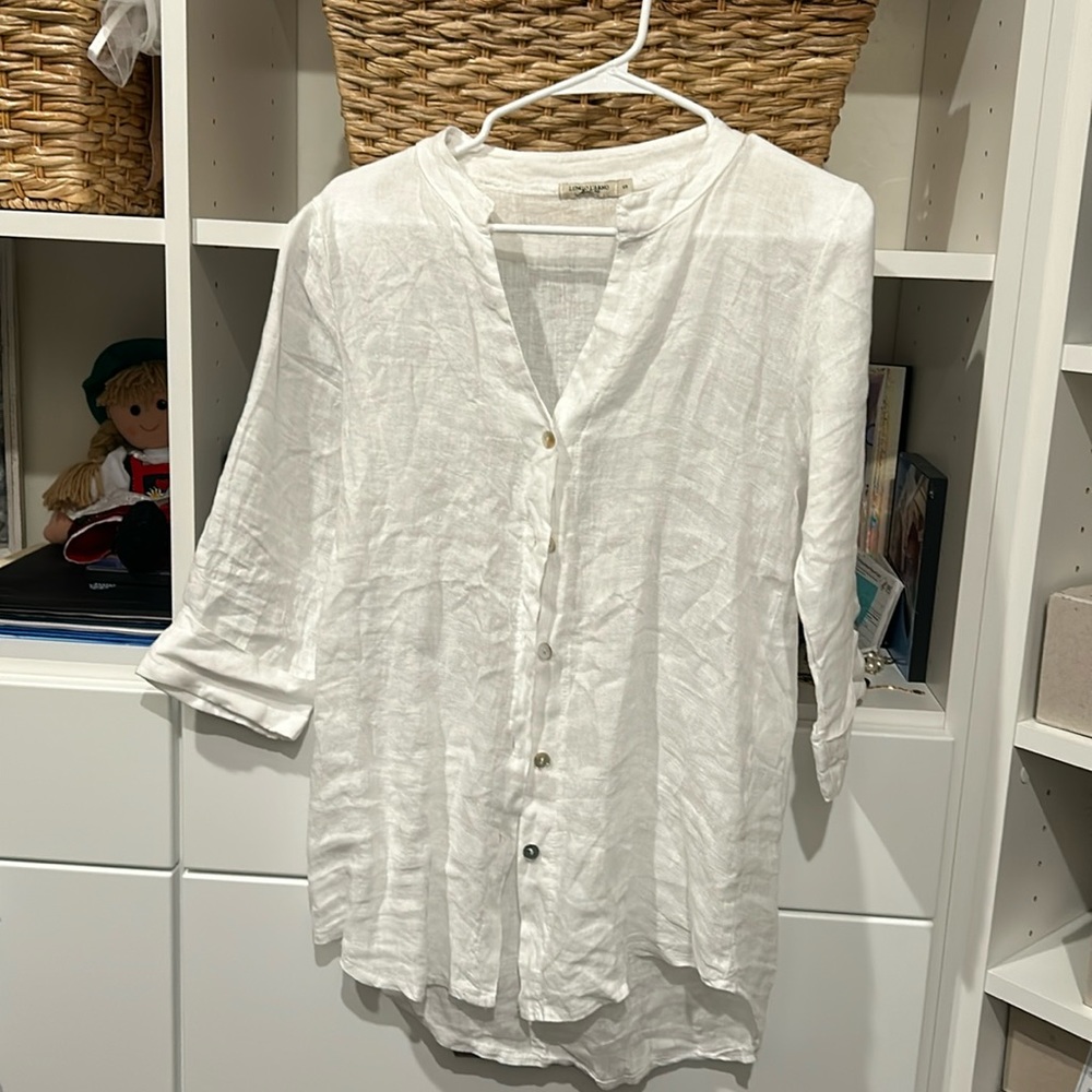 White shirt never worn. Size small